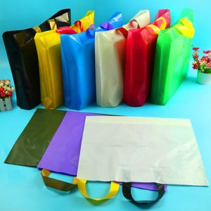 100pcs/lot 38*32cm High quanlity environmental protection Plastic Shopping Bags Apparel Promotion handle Bag/Colorful folding bag