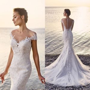 Strand Lace Mermaid Bröllopsklänning 2019 Sexig passform och flare Se igenom Tillbaka Appliques Tulle Bridal Gowns med Sheer Shoulder Cap Sleeve Button