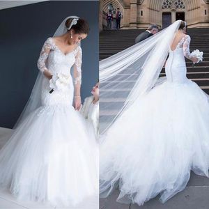 Abiti da sposa classici a coda di pesce con scollo a V sexy a maniche lunghe trasparenti con applicazioni senza schienale Nuovi abiti da sposa romantici a sirena in pizzo