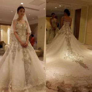 Sparkly Luxury Wedding Dress A Linha V Pescoço Correias Sem Mangas Cristais Requintados Lace Appliques Bling Bling Tulle Bidal Vestidos Long Train