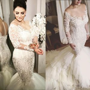 Illusion Jewel Neck Wedding Gown Applique Long Sleeve Covered Button Tulle Tiered Mermaid Bridal Dress Charming Chapel Train Vestido De Novi