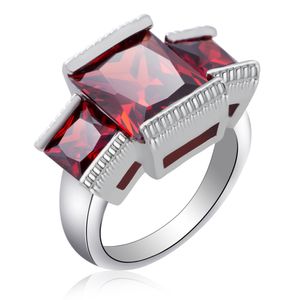 Fashion girl unico design dell'anello della signora tre grandi gioielli rosso rubino viola rosa cz zircone pietra anello per gli amanti fidanzamento matrimonio materiale in ottone con argento placcato