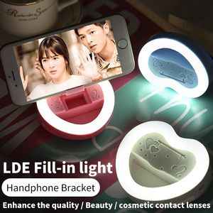 Universal Charm Eye 3 i 1 LED Flash Selfie Fill Light Heart Shape Mini Camera Blinkar Clip med Big Mirror Case Telefonhållare för Smartphone