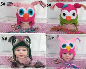 10ピースの冬の熱い販売の赤ちゃん手の編み物のフクロウの帽子ニット帽子子供の帽子11色かわいい帽子の子供たちの男の子と女の子の帽子送料無料