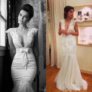 Sexy Mermaid Wedding Dress Deep V Neck Lace Appliques Cap Sleeves See Through Back Trumpet Bridal Gowns Tulle Skirt Custom Made Bow