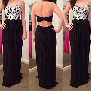 Neu eingetroffene sexy schwarze Ballkleider mit Spitzenapplikationen, Herzausschnitt, trägerlos, Ausschnitt, offener Rücken, langes formelles Abend-Partykleid, günstig