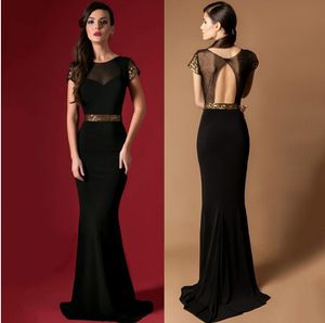 2016 Goedkope zwarte lange jurken bemanning een lijnvloer lengte avondjurken dameskleding Sheer nek pailletten backless prom formele jurken