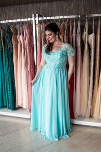 Plus Size Lace Aplikacje Suknia Wieczorowa V-Neck A Line Prom Dress Cap Sleeve Szyfonowa Długość podłogi Vestidos Festa