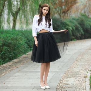 十代の少女のための黒い素敵なスカートのためのティアリングフリル膝丈パーティースカート2017ファッションレジャーカスタムメイドのスカート安い100％実画像