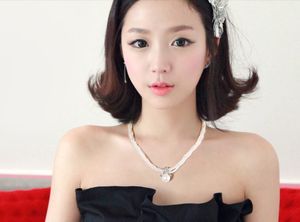 Multiple diamond fine imitation pearl necklace pendant. The choice of beautiful lady