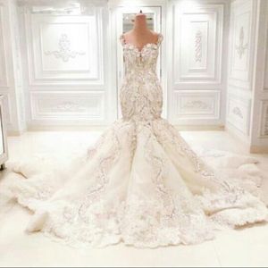 Abiti da sposa in cristallo di lusso Abiti Dubai Sirena Tromba Fit e Flare Appliques in pizzo con perline Abiti da sposa con perline impreziositi da fiori