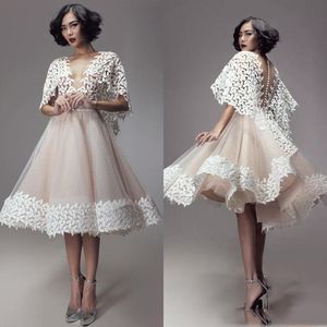 Gorgeous Lace Appliques Sheer Neck Short Prom Dresses Saudi Arabia Illusion Back Covered Buttons Tulle Evening Gowns Cocktail Party Dress