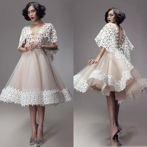 Wspaniałe Koronkowe Aplikacje Sheer Neck Krótkie Prom Dresses Saudyjska Arabia Illusion Back Zadłane Przyciski Tulle Suknie wieczorowe Cocktail Party Dress