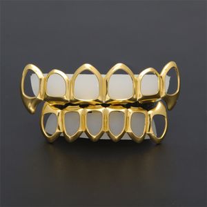 Neuer Hip Hop Custom Fit Grill Sechs hohle offene Gesicht Gold Mund Grillz Caps oben unten mit Silikon Vampirzähne Set