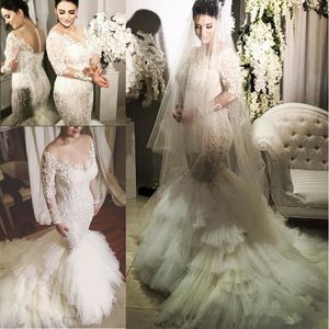 Illusion Neck Långärmade Bröllopsklänningar 2017 Beaded Appliques Tulle Tiered Mermaid Bridal Dress Charming Chapel Train Vestido de Novi