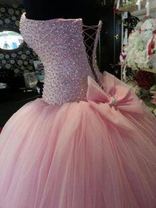 2017 New Puffy Pink Quinceanera Dresses with Big Bow Sweetheart Beaded Crystal Corset Lovely Sweet 16 Dress For 15 Years Prom Gowns QU05