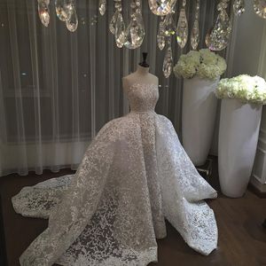 Splendidi abiti da sposa trasparenti con strascico staccabile Scollatura trasparente Applicazioni di pizzo con paillettes Abiti da sposa Splendido abito da sposa A Line