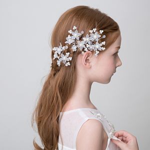 Utsökt manuell blomma tjejer hairbows härliga barntillbehör för bröllop peral design barn formell slitage gratis frakt