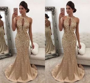 Sexy Arabic Sier Gold Evening Dresses Wear Jewel Neck Keyhole Crystal Beading Mermaid Satin Open Back Sweep Train Formal Party Dress Prom Gowns 403