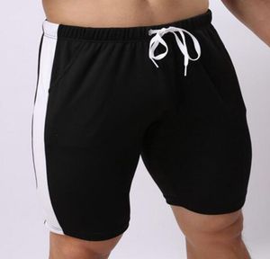 Atacado- verão lazer ativo shorts gays homens calças elásticas marca homens shorts moda moda rápida seca vestir calças em casa