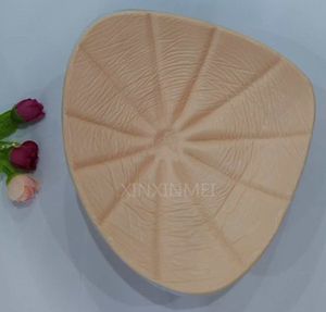 Forme di seno finte in silicone morbido con tette naturali di spedizione gratuita per donna a forma di triangolo di colore beige intera vendita