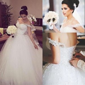 Wholesale sparkly puffy wedding dresses resale online - Modest Arabic African Sparkly White Lace Ball Gown Plus Size Wedding Dresses Formal Beading Lace up Back Church Bridal Gowns Puffy