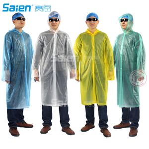 100 pcs PVC espessado transparente chuva ponchos, macacão moeda elétrica moda capa de chuva, homens e mulheres terno de fissão