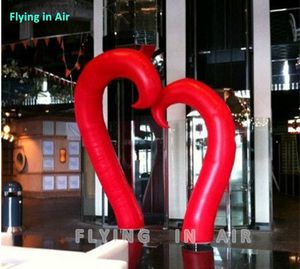 A Pair of Valentine's Day/Club Entrance Tusk Arch Inflatable Closer Hearts Arch Air Blow Up Cones With Light For Events