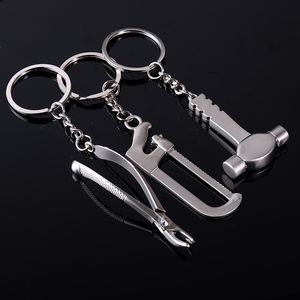 Dental forceps, caliper, vise, serrated wrench, metal key, auto key ring, chain link, pendant