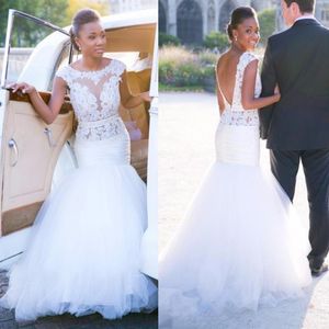 Sexiga Öppna Bak Bröllopsklänningar 2018 Lace Top Cap Sleeves Mermaid Bridal Gowns Tulle Sweep Train African Style Garden Wedding Vestidos