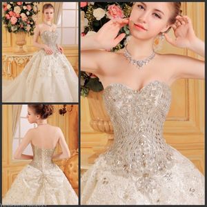 Bling Sweetheart Luxury Bröllopsklänningar Beaded Swarovski Crystal Sexy Ball Gown Lace Applique Court Train Tulle Diamond Bridal Gown med Bow