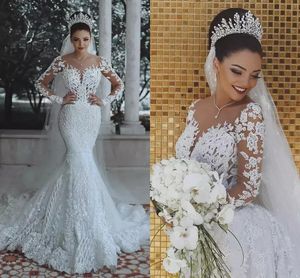 2019 Luxus-Meerjungfrau-Hochzeitskleider, transparenter Ausschnitt, Perlen, Kristallspitze, Applikationen, arabische lange Ärmel, Überröcke, formelle Brautkleider in Übergröße
