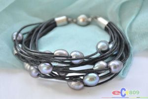 Bracciale in pelle nera con perle d'acqua dolce di riso nero da 15 file da 8 pollici e 13 mm