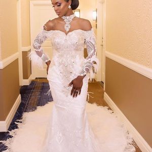 Dubai Luxury Feather Wedding Dress Beaded High Neck Long Sleeves Applique Lace Bridal Dress Crystal Backless Mermaid Wedding Gowns