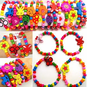 100pcs ragazze braccialetti di perline di legno naturale stili mix bambini braccialetti di legno bambino partito riempitivi regalo di compleanno gioielli all'ingrosso