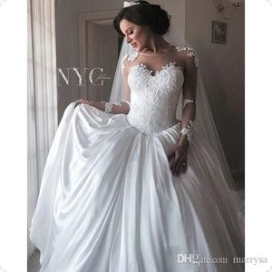 Sheer Long Sleeves Ball Gown Satin Wedding Dresses Lace Appliques Illusion Buttons Back Ivory White Princess Puffy Bridal Gowns Aso Ebi Style