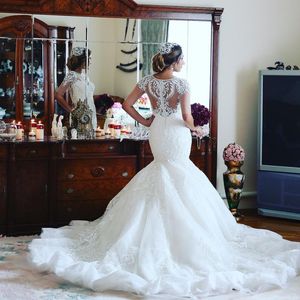 Elegantes Dubai-Meerjungfrau-Hochzeitskleid mit Juwel-Ausschnitt und halben Ärmeln, Perlen, Spitze, Applikation, Brautkleid, bezauberndes, langes Brautkleid aus Afrika-Arabien-Tüll