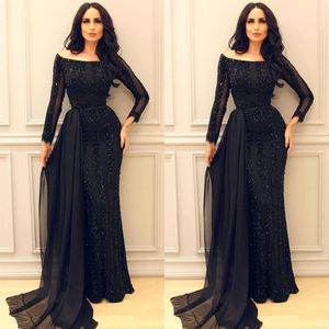 Sparkly Black Long Sleeve Mermaid Prom Klänningar 2018 Modest Mellanöstern Arabiska Arabiska Sexiga Sequined Pärlor Formella Aftonklänningar