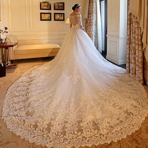 Abiti da sposa di lusso Cattedrale di treno dalla Cina Scollo a V Illusion maniche a 3/4 Perline Paillettes Applicazioni di pizzo Abiti da sposa trasparenti sul retro