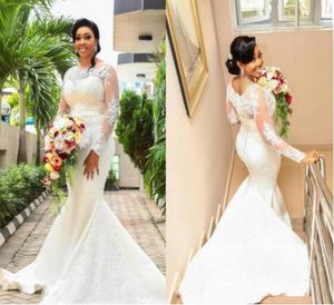 African Mermaid Wedding Dresses Lace Appliques Sheer Long Sleeves Bridal Gowns Back Covered Buttons Chiffon Sweep Train Wedding Vestidos