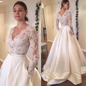 Vestidos De Casamento De Manga Longa De Renda Elegante A Linha Botão Coberto Do Vintage Vestidos De Noiva Baratos 2018 Praia Com Decote Em V Plus Size Vestidos De Casamento