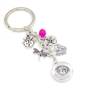 Nyankomst DIY Utbytbar 18 mm Snap Smycken Snap Key Chain Nyckelpiga Blomma Butterfly Dragonfly Nyckelring Väska Charm Snaps Nyckelring Presenter