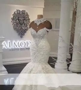 Luksusowe dubaj arabski syrenka suknie ślubne Plus rozmiar frezowanie kryształy sąd pociąg suknie ślubne z ograniczonymi rękawami suknia ślubna