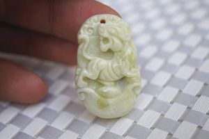 Hand-carved - lantian county, shaanxi province - white flying yellow jade (12 Chinese zodiac) tiger - elliptic necklace pendant (amulet)