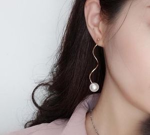 neue koreanische einfache Perlenohrringe mit langen und dünnen Brustwarzen, Perlenohrringe mit Accessoires im femininen Stil