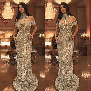 Lyxiga Rhinestone Crystals Prom Klänningar High Neck Pärlor Kortärmad Sparkly Mermaid Prom Klänning Stunning Dubai Celebrity Evening Dresses