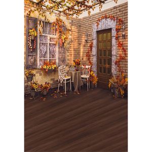 レンガの壁の窓とドアの写真背景木製の床プリントカエデの葉花秋のテーマパーティー写真ブースの背景