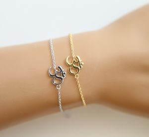 tiny yoga charm bracelet in 925 sterling silver material om bracelet with yellow gold rhodium plated