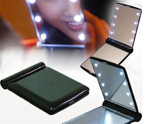 Portable LED Makeup Mirror Lady Makeup Kosmetisk Folding Compact Pocket Spegel 8 LED Lampor Lampor Mini Dubbel Side Comestic Mirror DHL Gratis