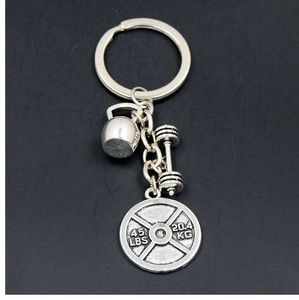 1PC Barbell Keychain Gym keep fitness Sport Kettle Bell And Strong Is Beautiful Charm body building Portachiavi per uomo Donna